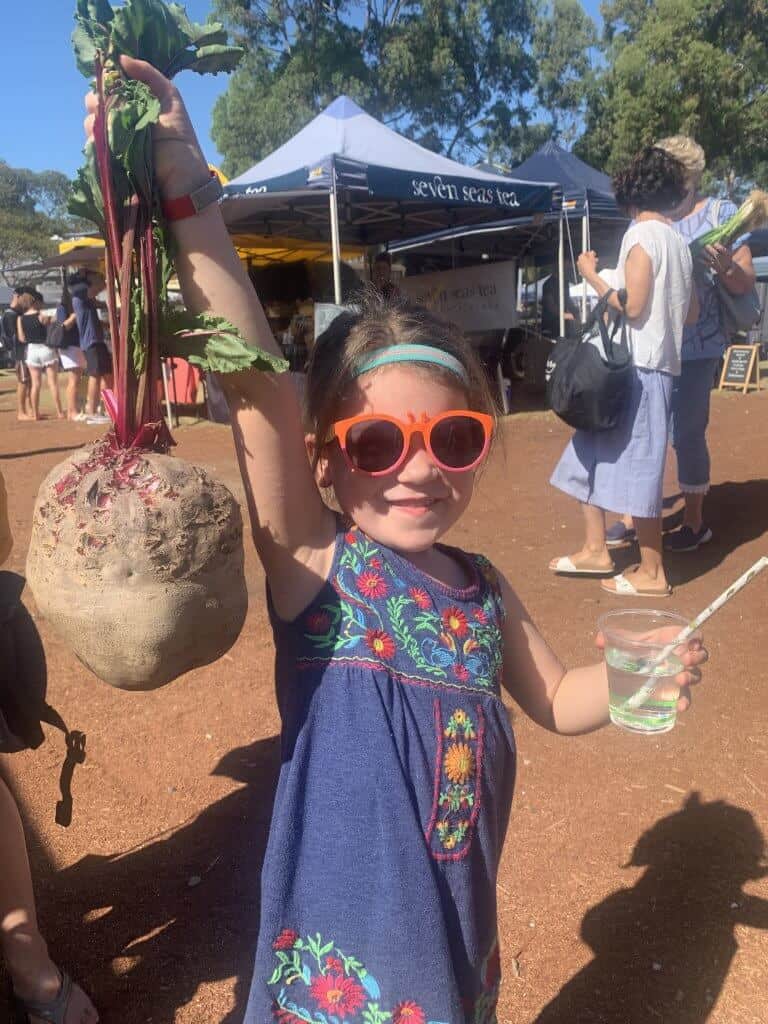 Margaret River market with large beet, how to save money traveling