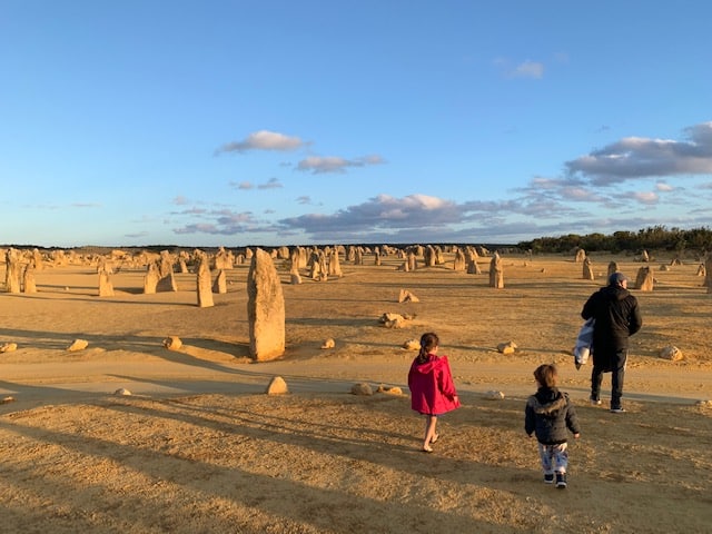 Family walking through The Pinnacles Desert