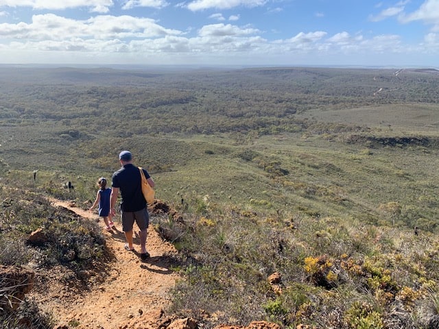 Father and young daughter hiking Mount Lesueur